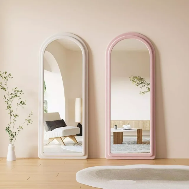 Arched full-length mirror with a soft flannel frame and whimsical rabbit ear accents, adding elegance and charm to home décor.